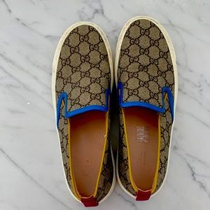 Gucci slip on shoes.